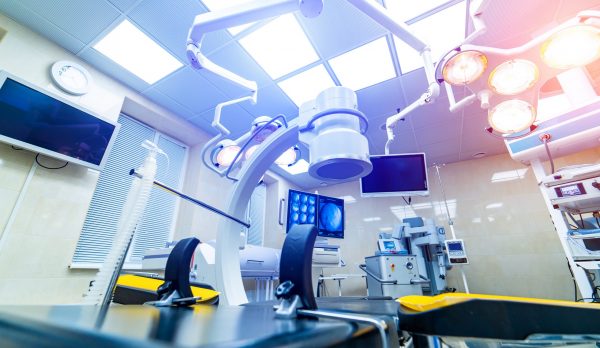 Clinic interior with operating surgery table, lamps and ultra modern devices, technology, hi-tech interior, Clinic interior with operating surgery table, lamps and ultra modern devices, technology, hi-tech interior,